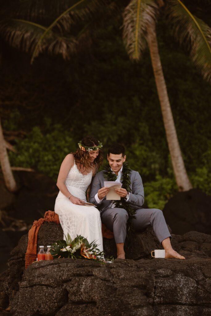 Eloping couple reading letters from family and friends