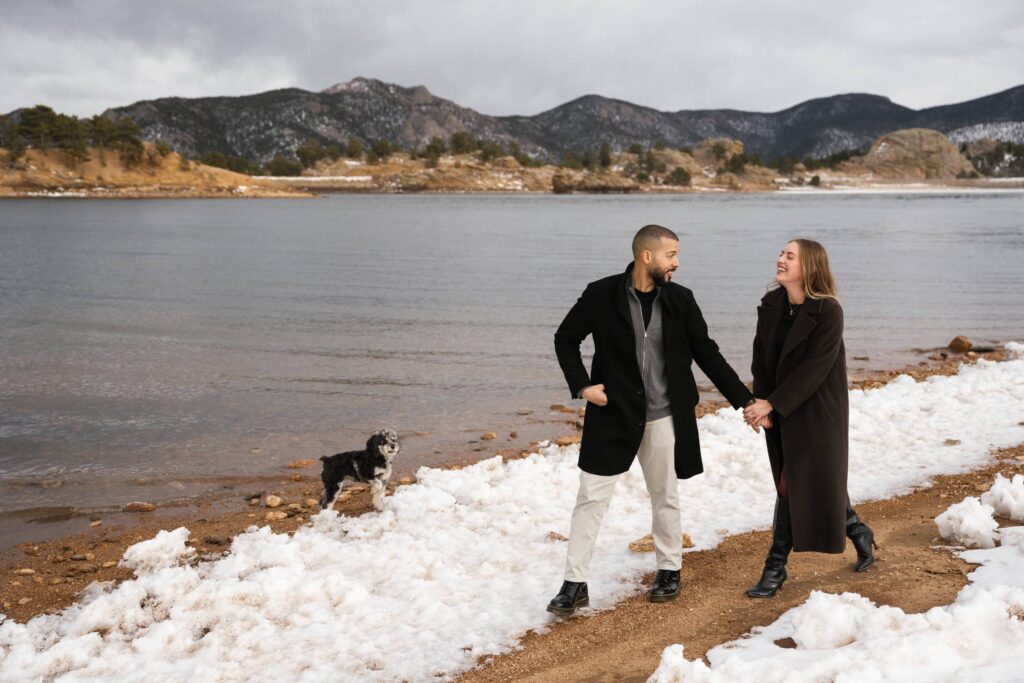 Engagement photos with dog at a mountain lake