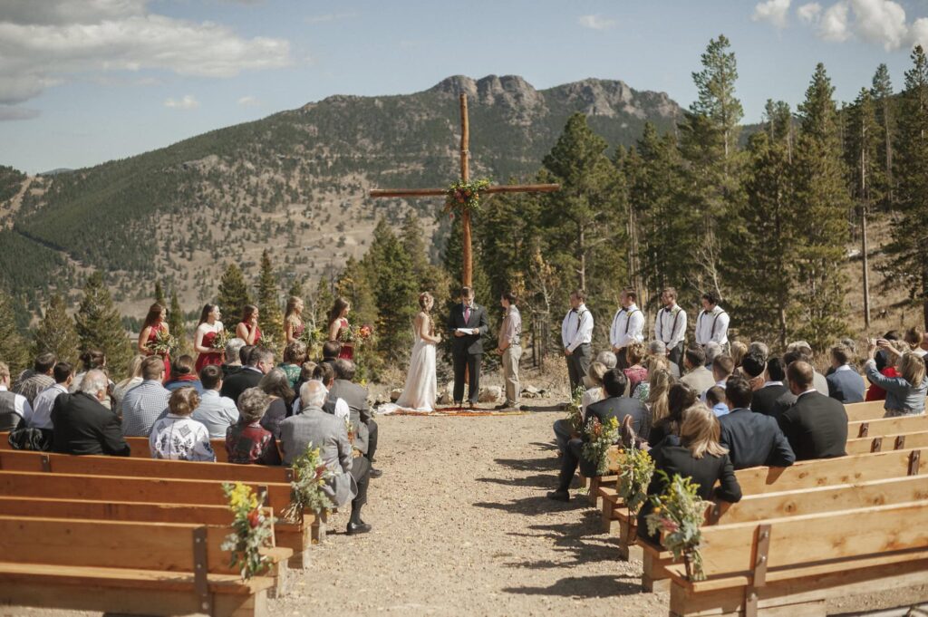 Outdoor wedding ceremony at YMCA of the Rockies Historic Mountainside Lodge