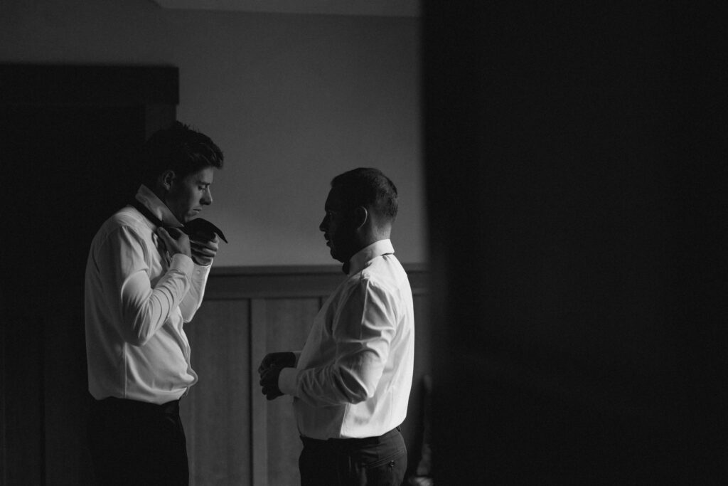 Groom and best man getting ready