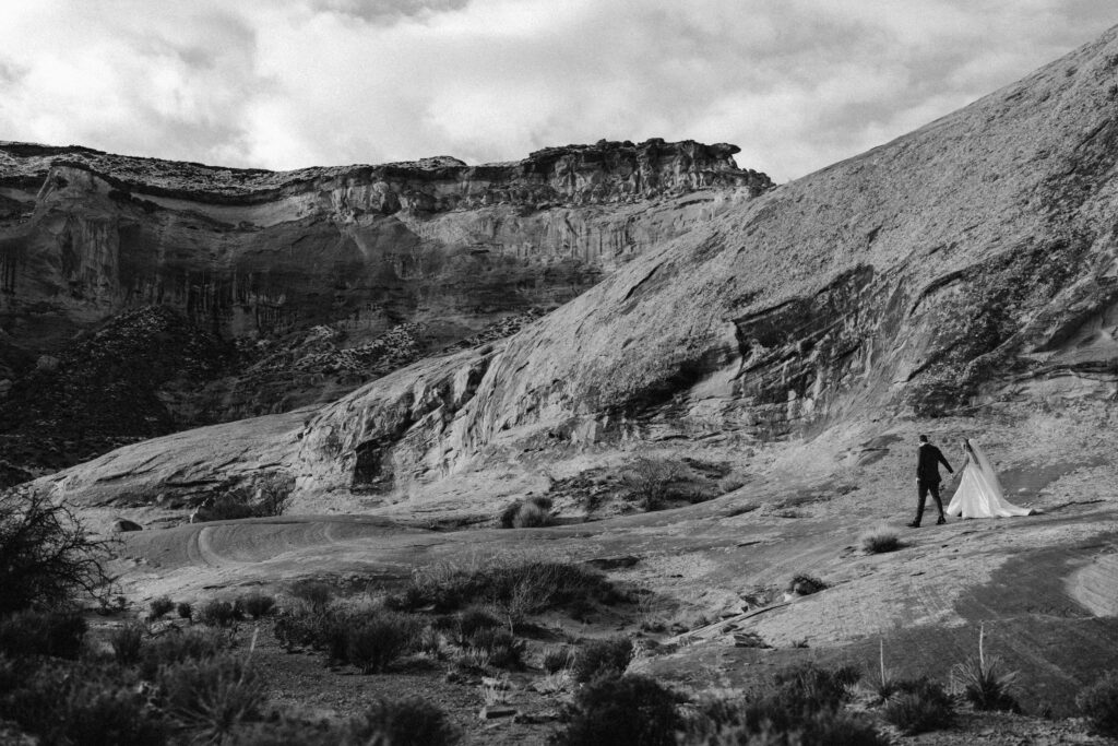 Dramatic elopement photos at Amangiri desert landscape