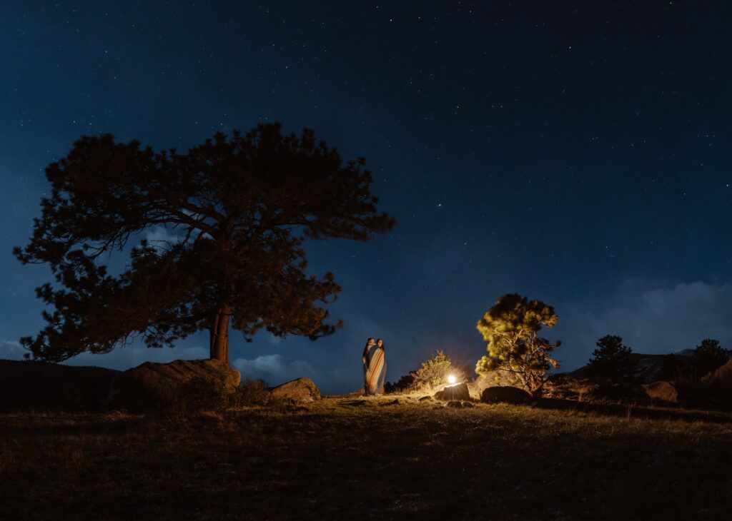 Couple stargazing in Rocky Mountain National Park