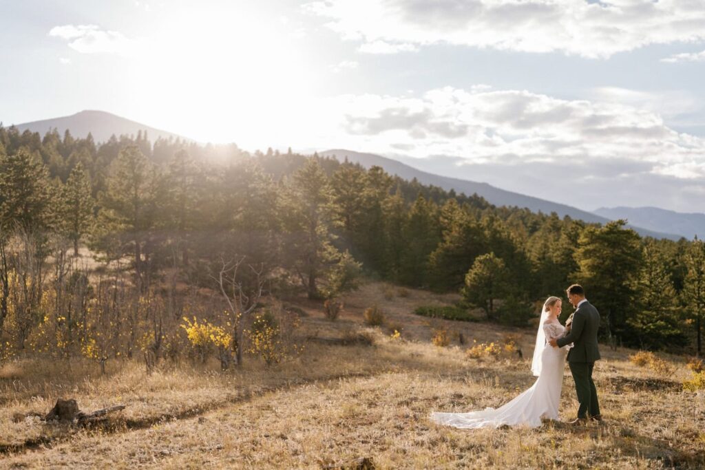 Romantic sunset elopement ceremony in Estes Park
