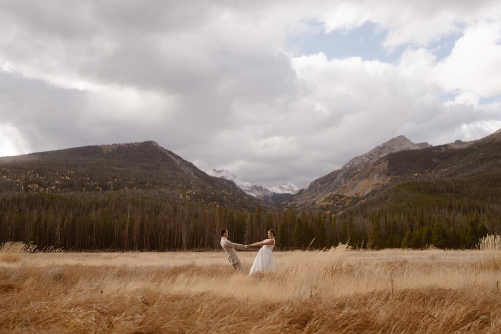 Estes Park wedding photos in an open meadow