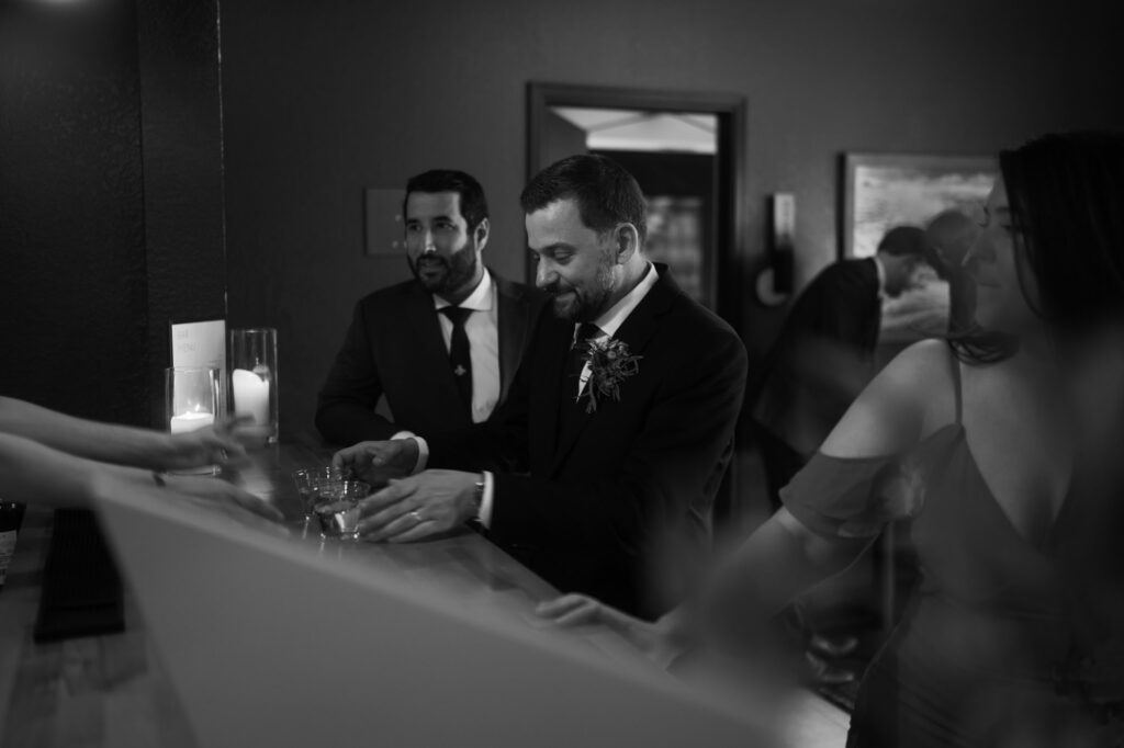 Groom at bar at Juniper Mountain House