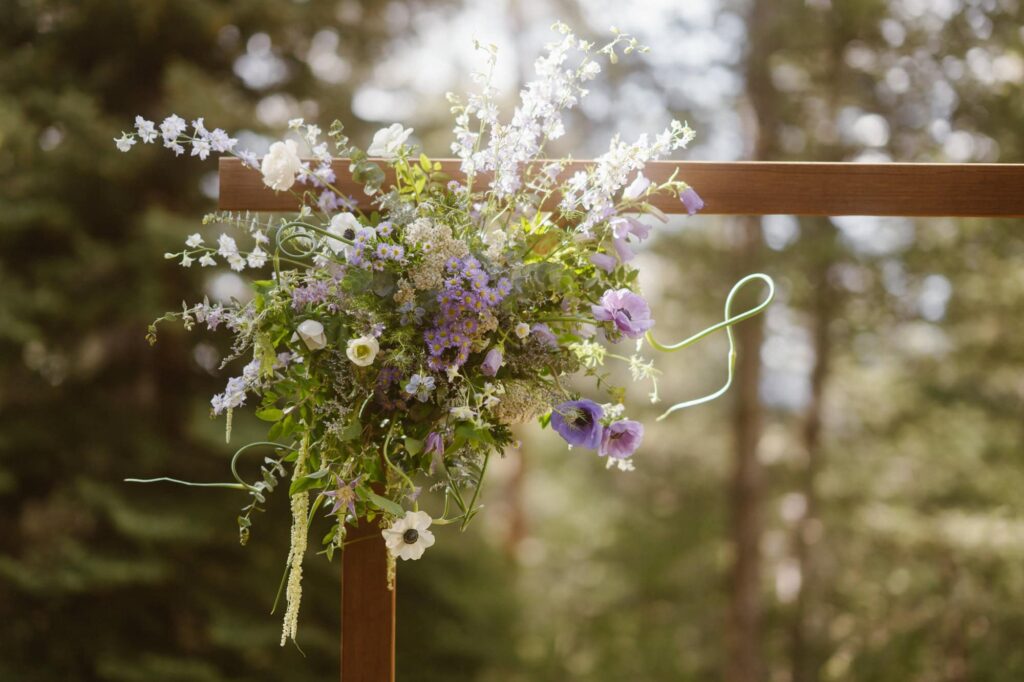 Purple wedding arch flowers