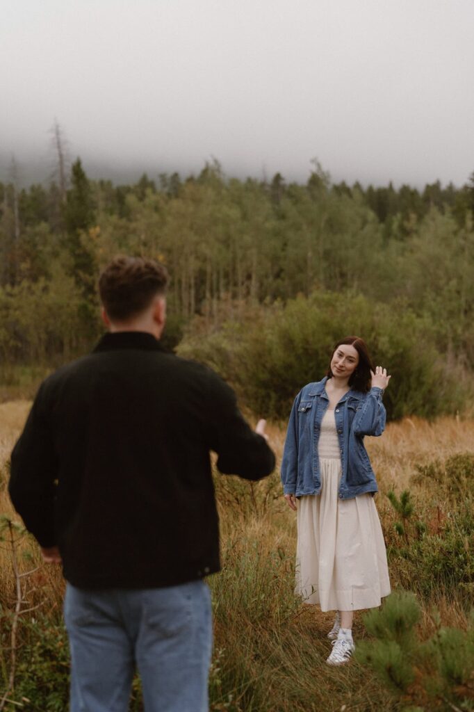 Moody engagement photos on a foggy day in Estes Park