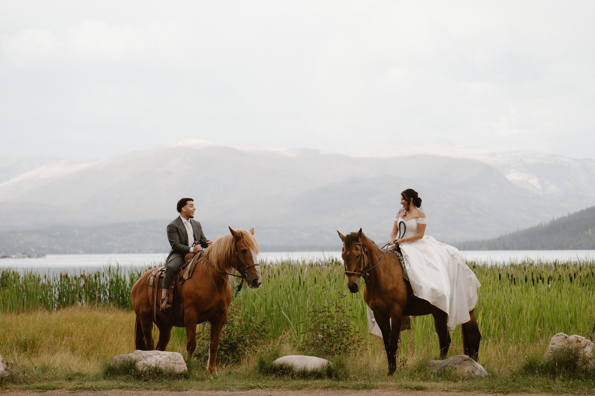 Wedding photos on horseback in Colorado mountains