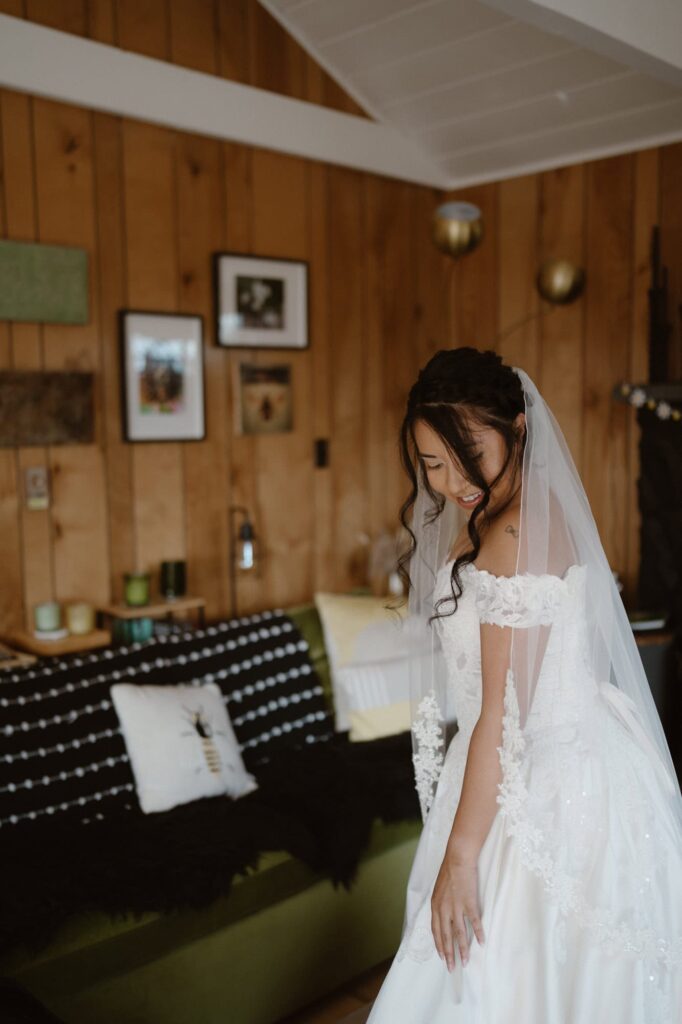 Bride inside Airbnb on her wedding day
