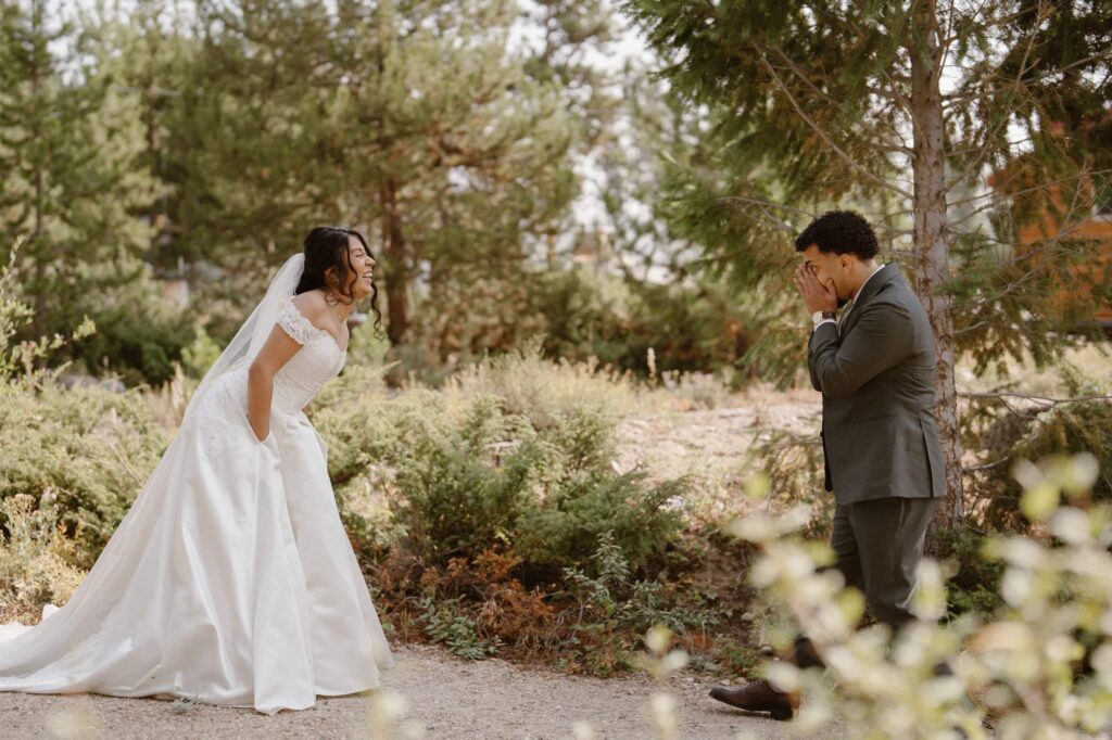 Emotional first look during Grand Lake elopement
