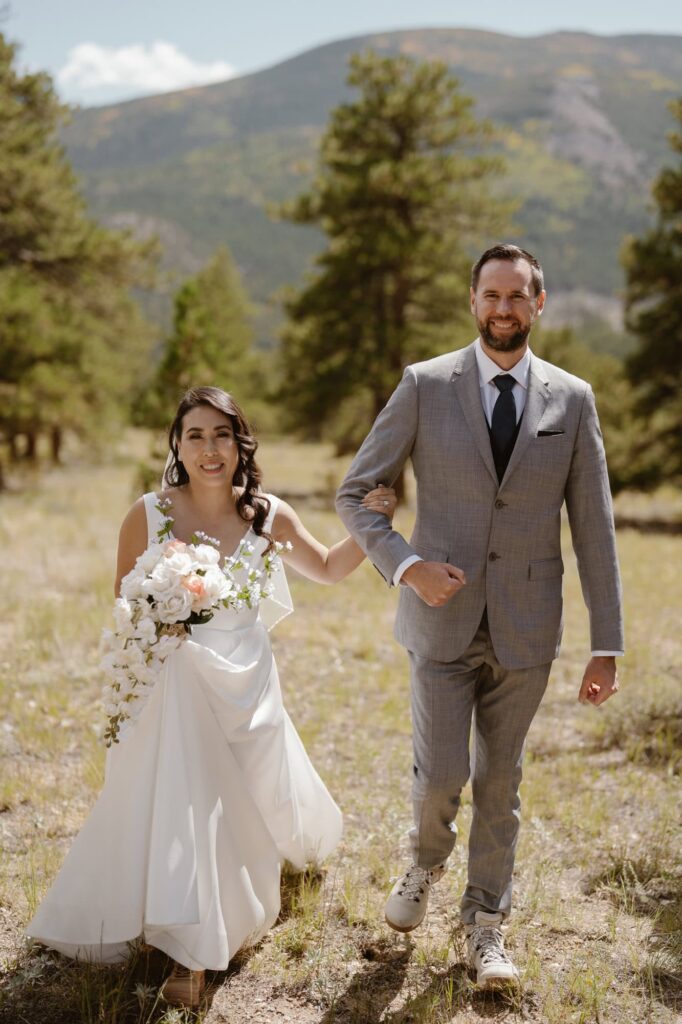 Bride and groom at intimate wedding ceremony in the mountains