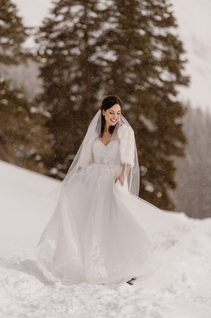 Bride in the snow with fur shawl