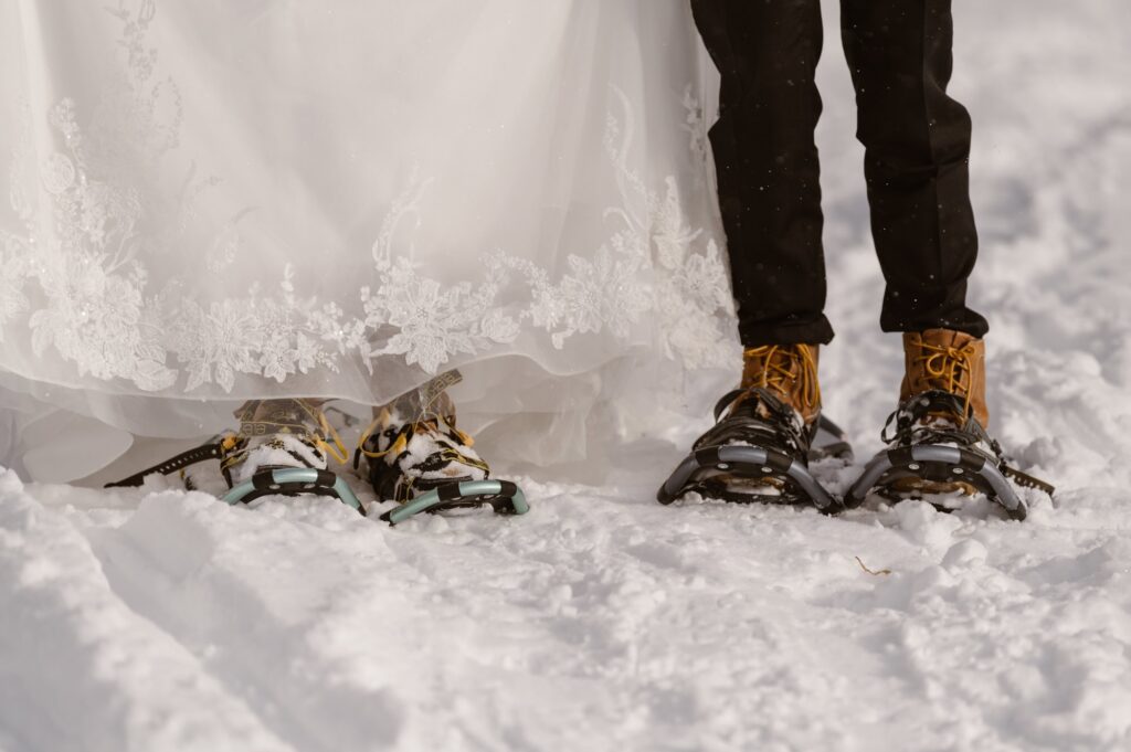 Bride and groom with snowshoes