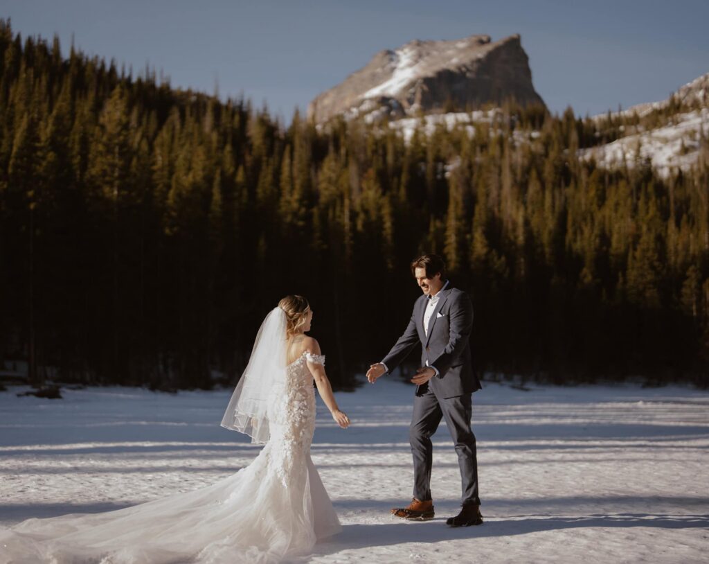Wedding day first look on Bear Lake in RMNP