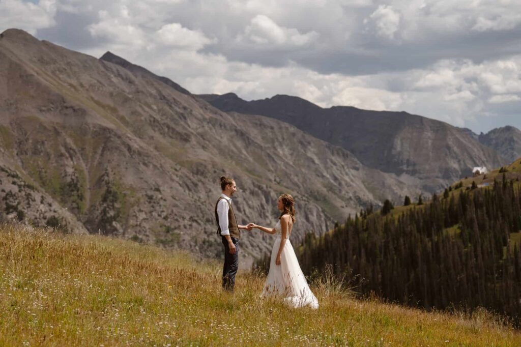 Mountainside first look wedding photos