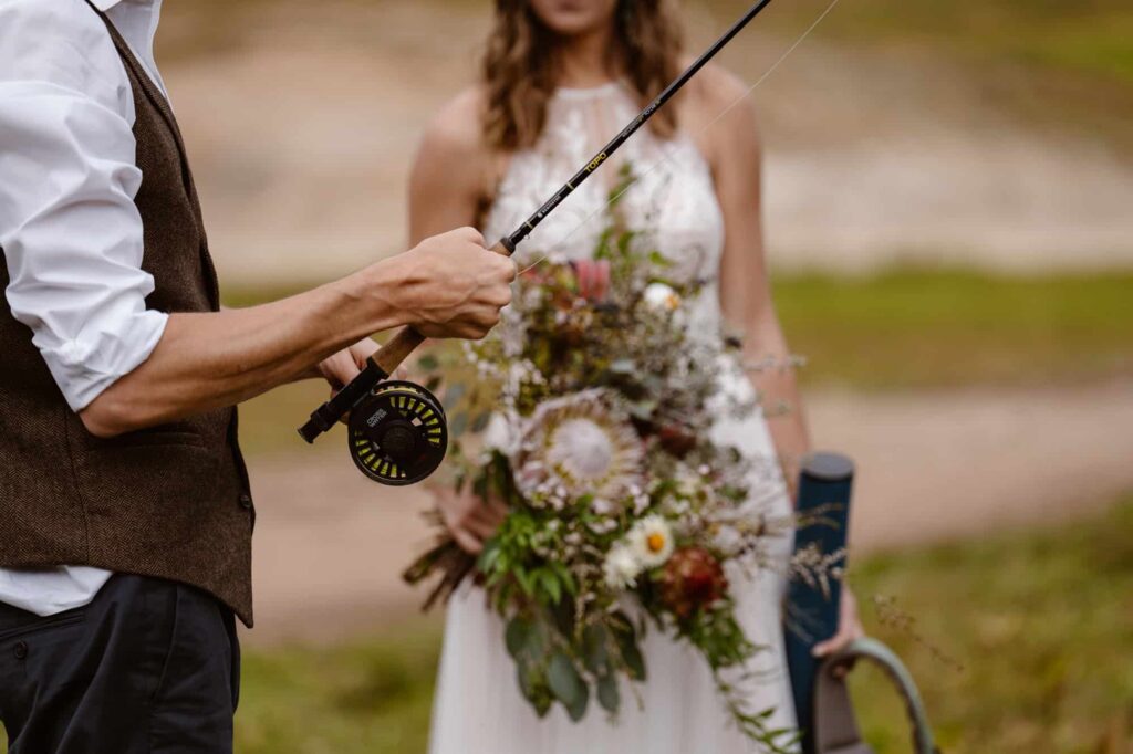 Fly fishing wedding photos at alpine lake in Colorado