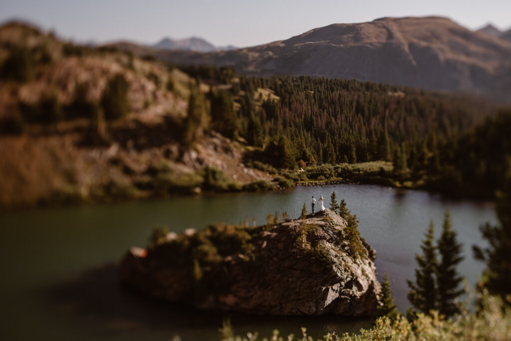 Bride and groom with epic Colorado mountain landscape