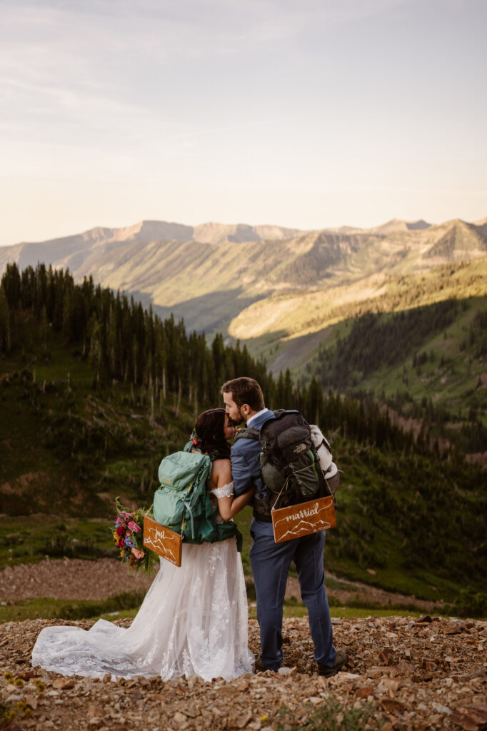 Couple eloping in Colorado mountains on a hike