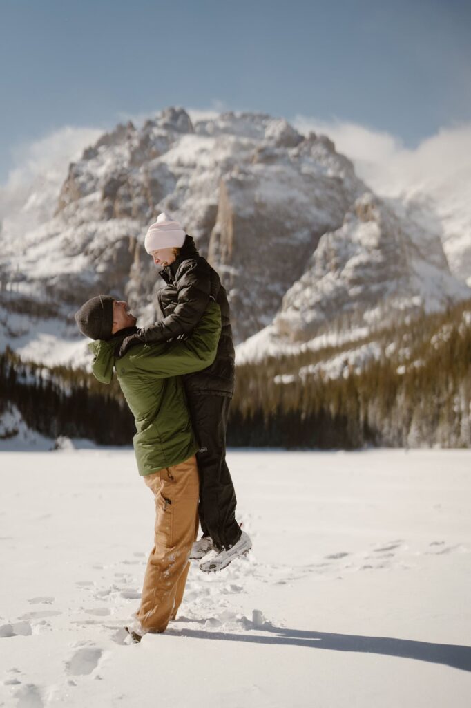 Surprise hiking proposal in winter in Rocky Mountain National Park