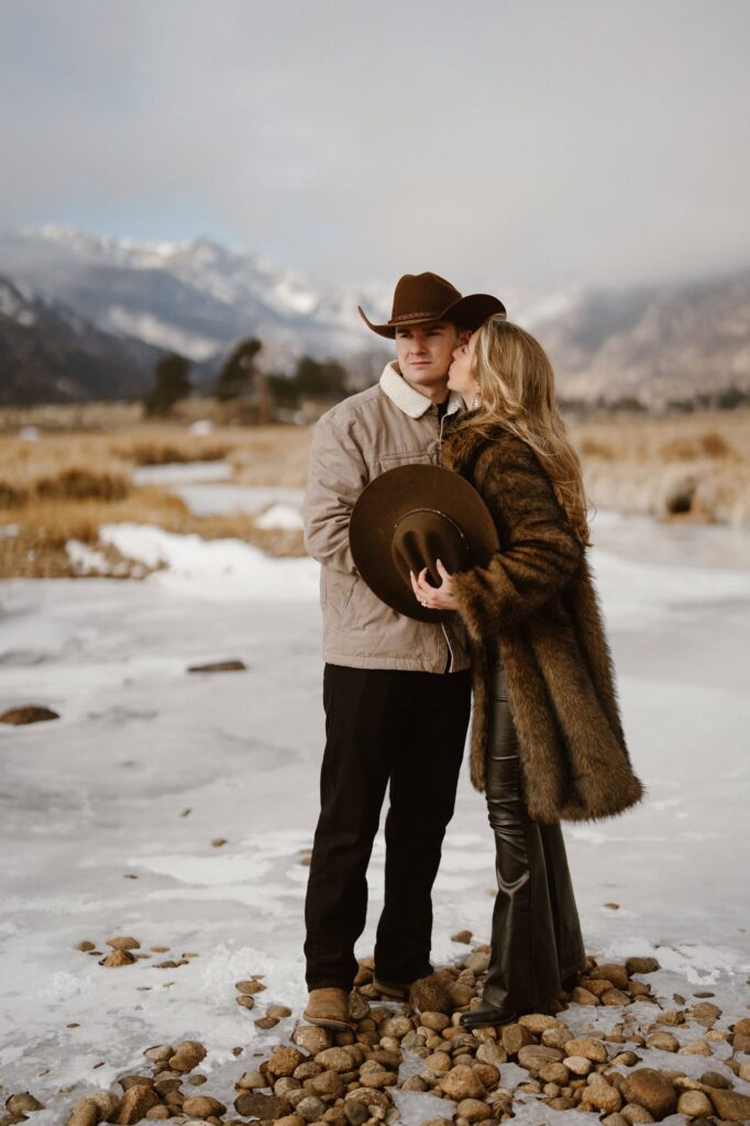 Western engagement photos in Colorado winter mountain landscape