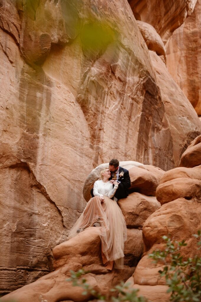 Unique desert wedding photos with long sleeve dress and colored skirt