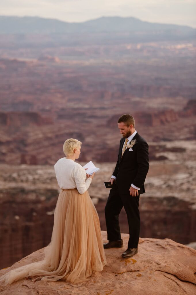 Elopement ceremony on cliff at Canyonlands National Park