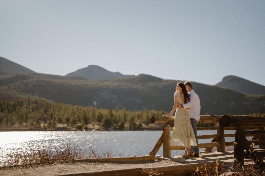 Romantic lakeside engagement photography at Lily Lake in Estes Park