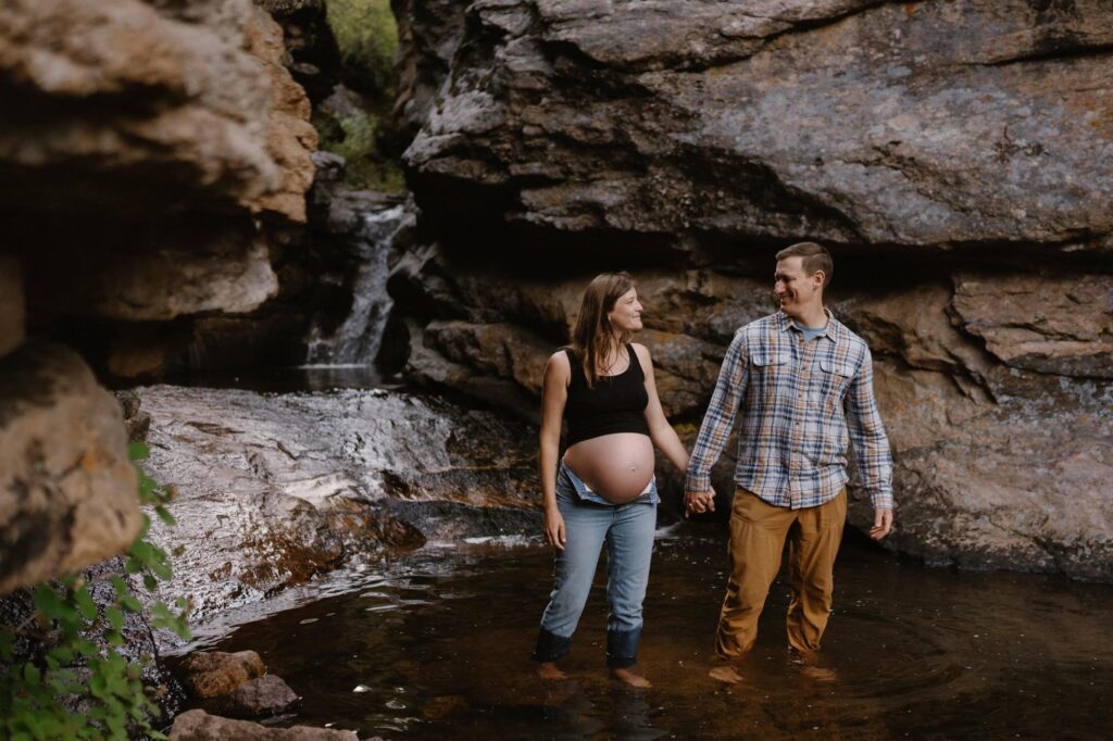 Estes Park maternity photos in a river