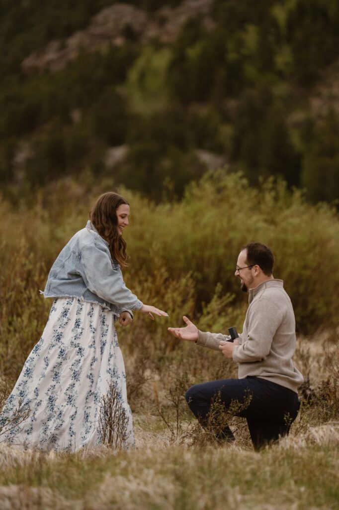 Surprise engagement in Estes Park mountains