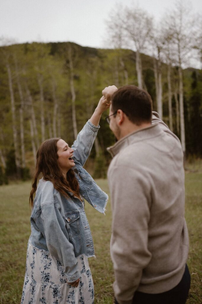 Couple dancing in the mountains