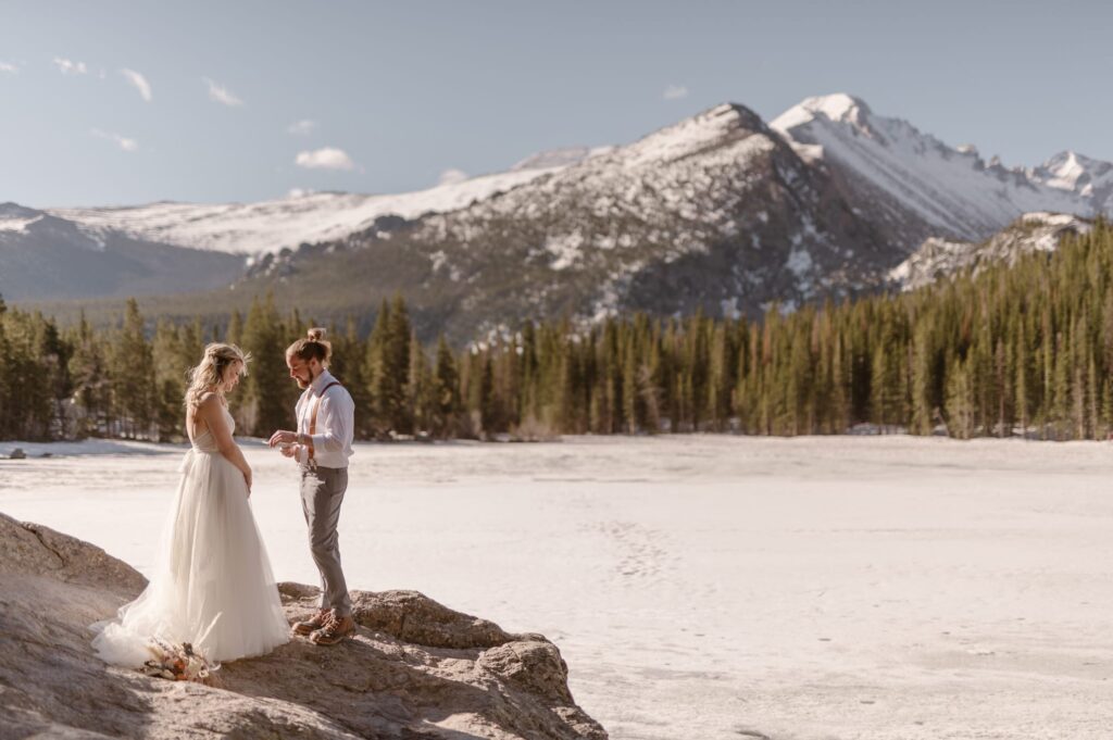 Couple getting married in Rocky Mountain National Park at Bear Lake in May