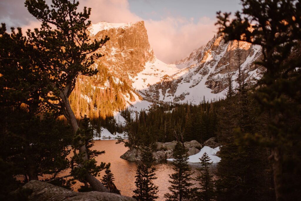 Alpenglow at sunrise at Dream Lake in Rocky Mountain National Park