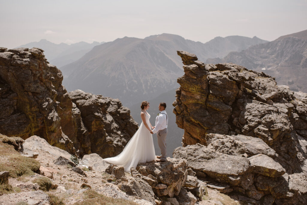 Couple standing on the edge of a cliff on Trail Ridge Road