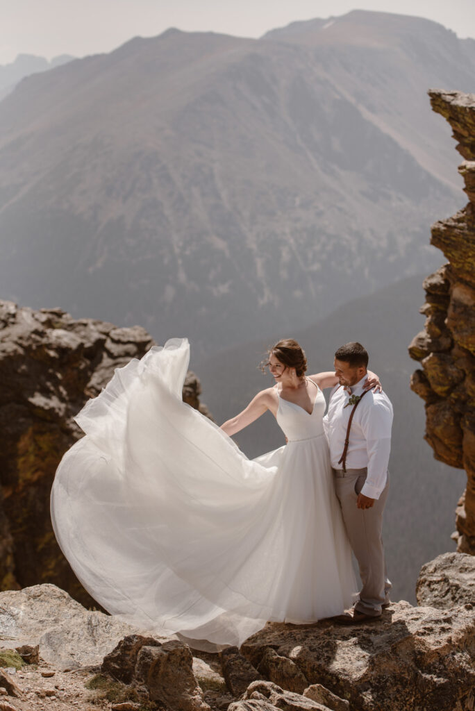 Flowy wedding dress in the mountains