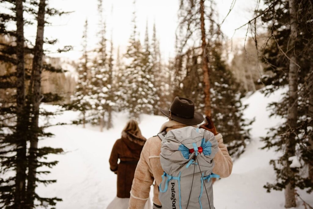 Action shot of hiking up to Dream Lake in Estes Park during a lifestyle portrait photography session