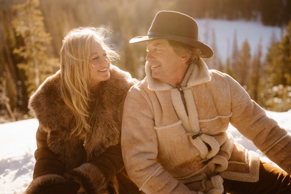 Close up of smiling and happy couple during their lifestyle portrait photography session in Estes Park, Colorado