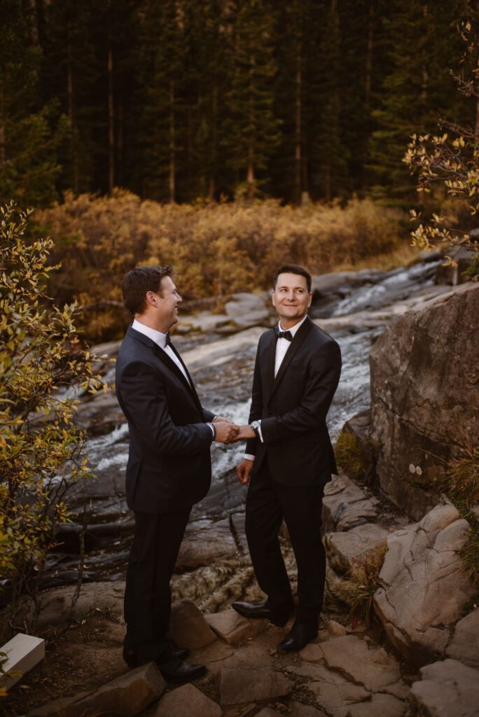 LGBTQ couple getting married at a waterfall in Colorado