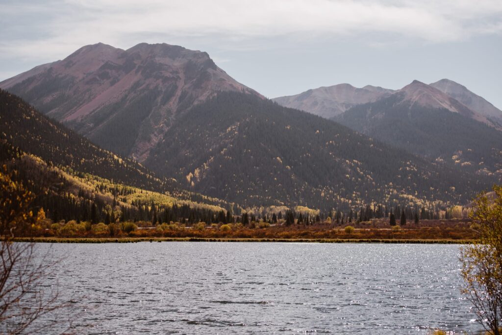 colorado lake in september with fall foliage