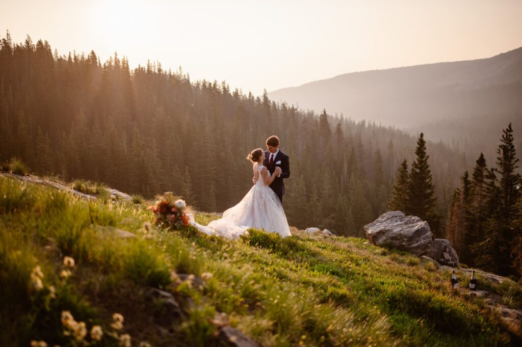 elopement first dance near a mountain lake