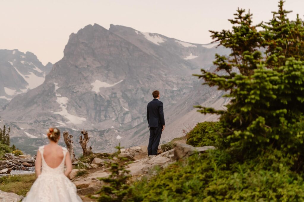 couple about to have a first look at a Colorado mountain lake elopement