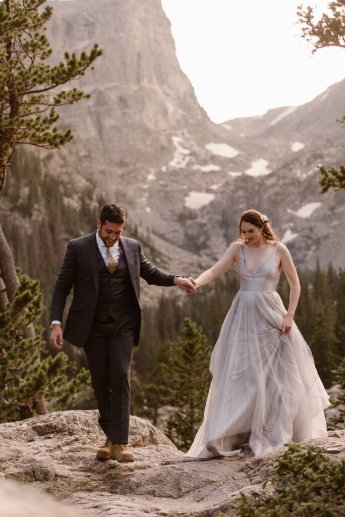 Bride and groom in the mountains on their wedding day
