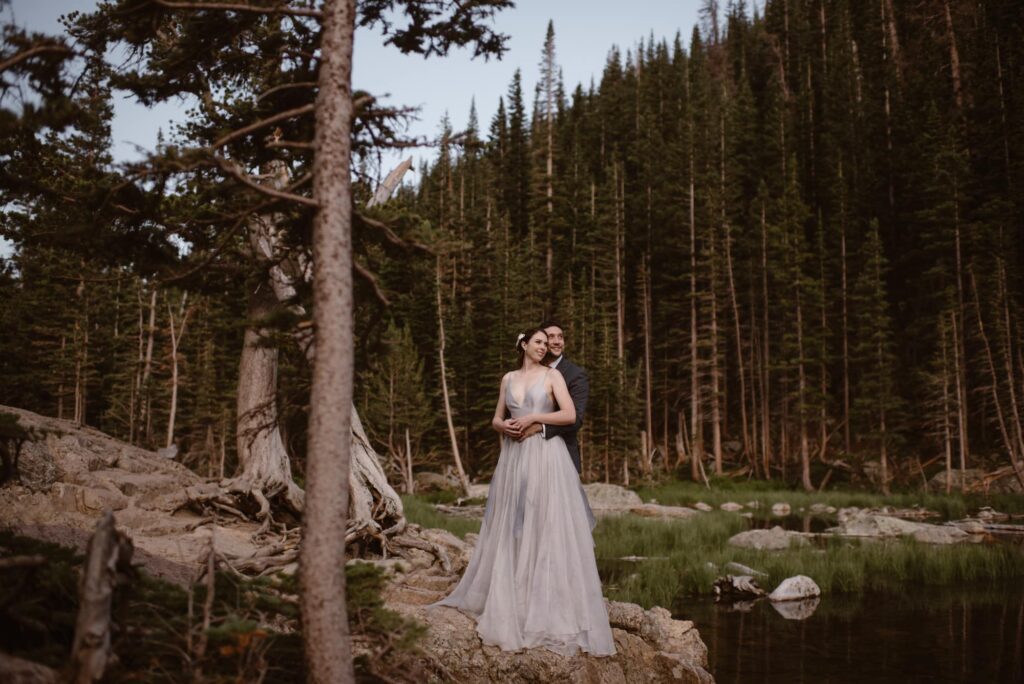 Couple looking at the Rocky Mountains on their elopement day