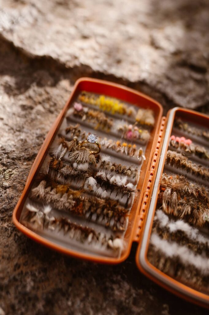 Engagement ring in the fly box after a fly fishing proposal