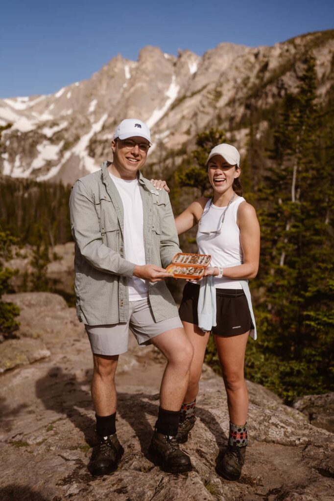 Excited couple after surprise proposal in Colorado