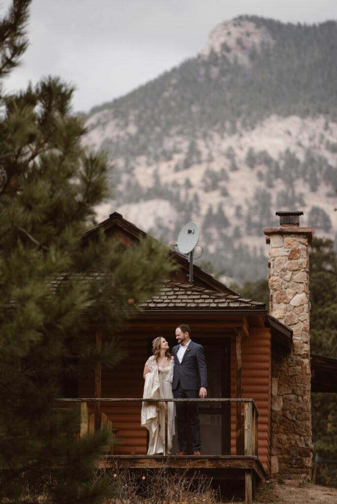 Couple on the balcony of their cabin