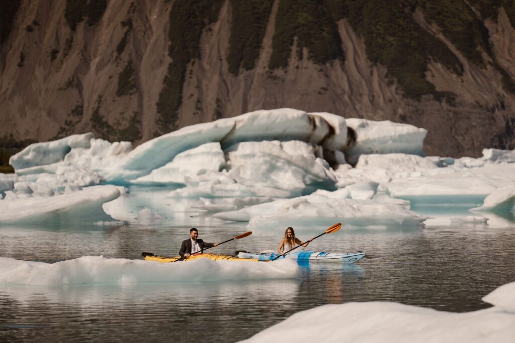 Adventure elopement with kayaking in a glacier in Alaska