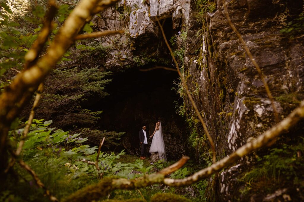 Bride and groom in a secret cave in Alaska