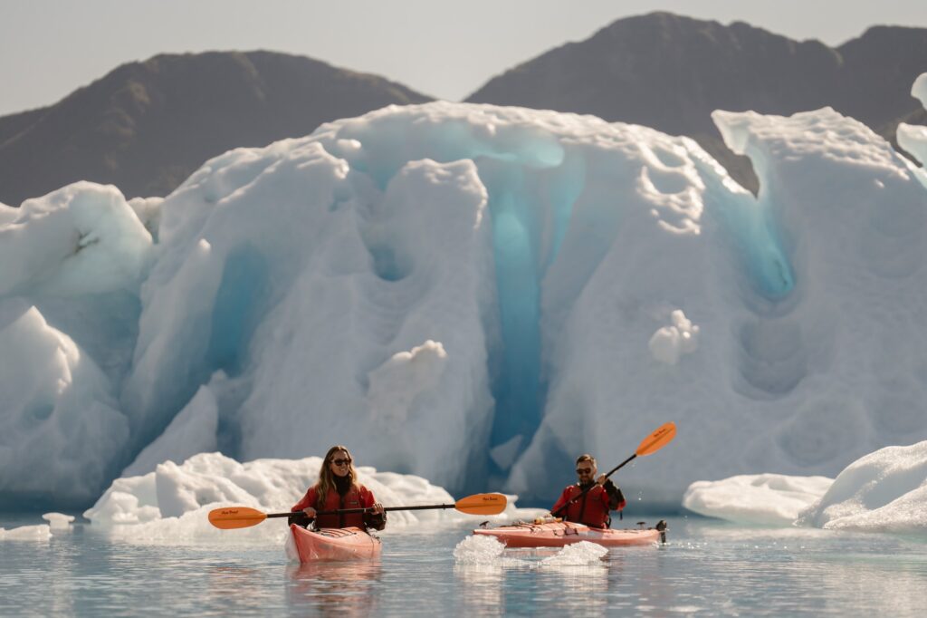 Kayaking through icebergs in Alaska