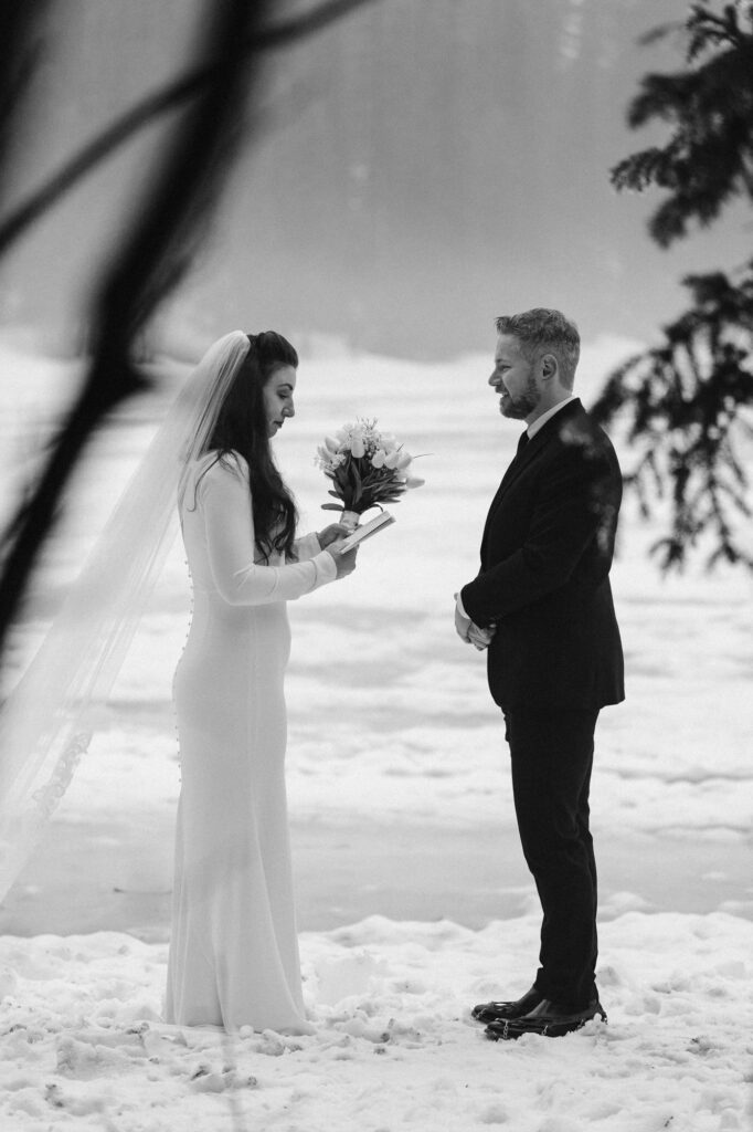 Couple exchanging vows in the snow