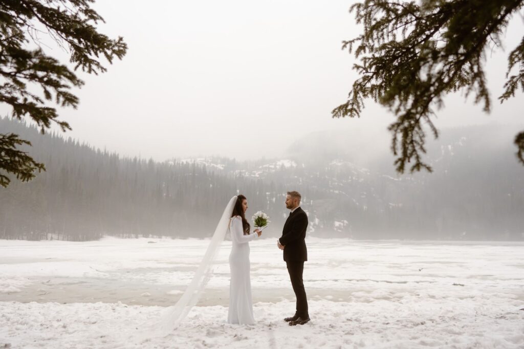 Couple getting married on the shore of Bear Lake in May